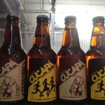 Bottles of beer from Cucapa Brewing Co. of Mexicali, one of the first microbreweries in Baja California, line a shelf at the Street Food Market party held March 24, 2013 in the San Diego Public Market. (Photo by Cyndia Zwahlen for the Small Biz Mix)