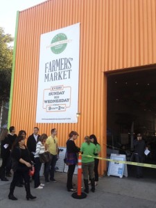 Partygoers wait outside the San Diego Public Market to join the Street Food Market party inside, March 24, 2013. (Photo by Cyndia Zwahlen for the Small Biz Mix)